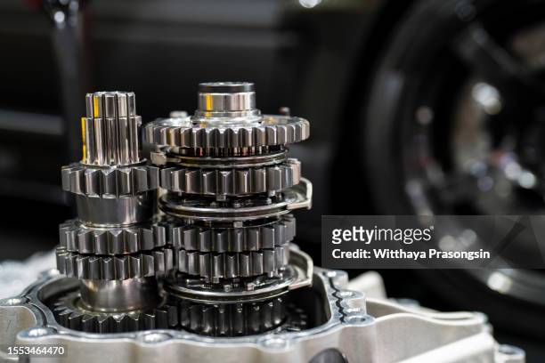 closeup gears of car engines - pezzo di ricambio foto e immagini stock