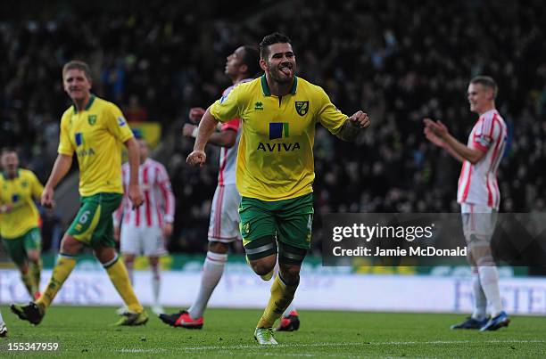 Bradley Johnson of Norwich City celebrates his goal during the Barclays Premier League match between Norwich City and Stoke at Carrow Road on...