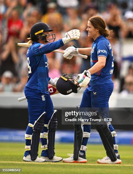 Nat Sciver Brunt of England celebrates their century with team mate Danni Wyatt during the Women's Ashes 3rd We Got Game ODI match between England...