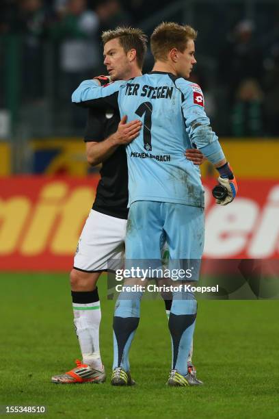 Thorben Marx and Marc-Andre ter Stegen of Moenchengladbach look dejected after the Bundesliga match between VfL Borussia Moenchengladbach and SC...