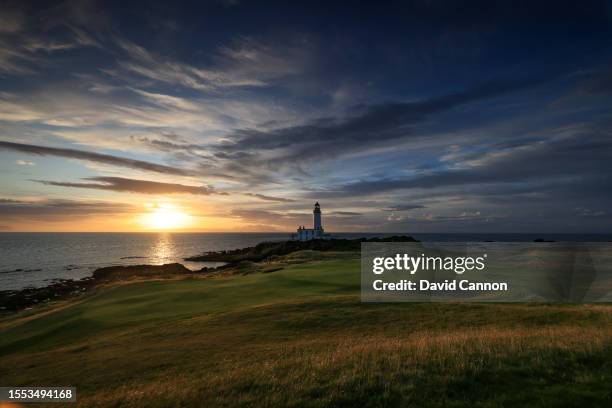 View of the green on the par 3, ninth hole beside The Turnberry Lighthouse as sunset on the Ailsa golf course at Trump Turnberry resort on July 09,...