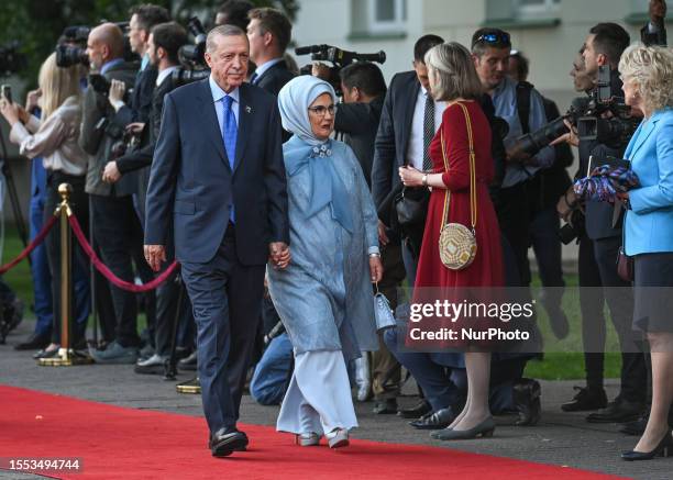 President of Turkiye Recep Tayyip Erdogan and first lady Emine Erdogan on their way to a social dinner at the Presidential Palace in Vilnius, on the...