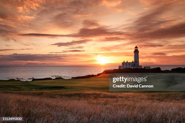 View of the green on the par 3, ninth hole beside The Turnberry Lighthouse as sunset on the Ailsa golf course at Trump Turnberry resort on July 09,...