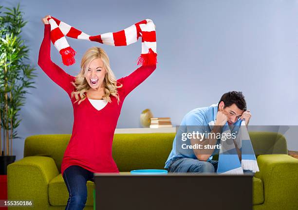 red success - female football fans stock pictures, royalty-free photos & images