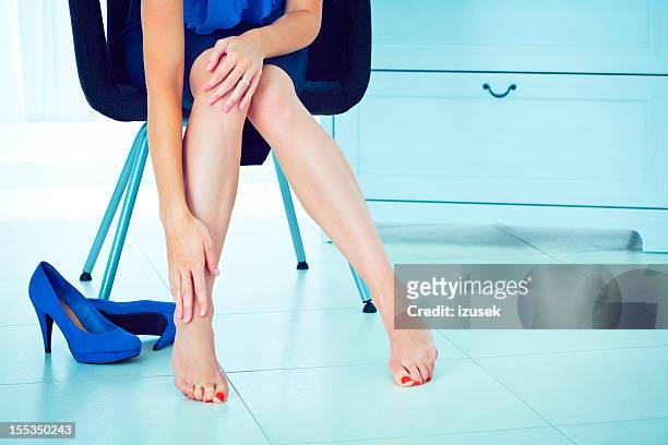 leg pain - high heels pain stock pictures, royalty-free photos & images