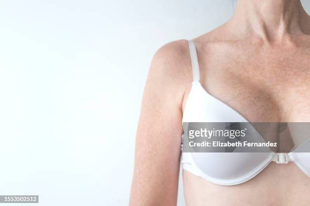 woman in white bra. care and beauty concept. - body photos et images de collection
