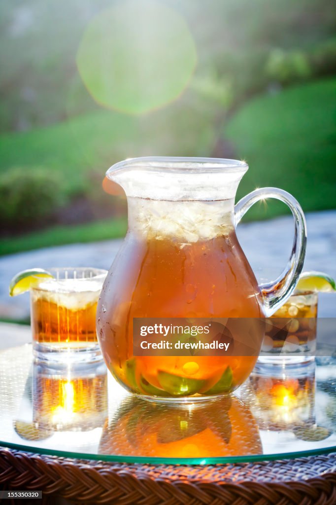 Pitcher of refreshing ice tea with lime.