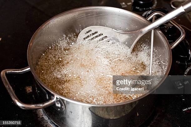 frying - canola oil stock pictures, royalty-free photos & images