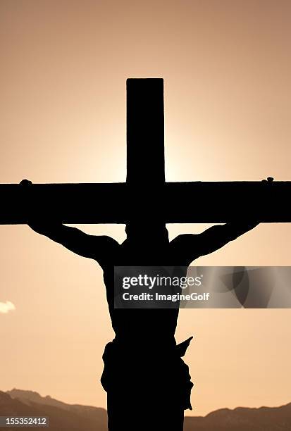 crucifixion silhouette - good friday stock pictures, royalty-free photos & images