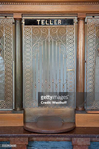 bank teller window - inside of bank stock pictures, royalty-free photos & images