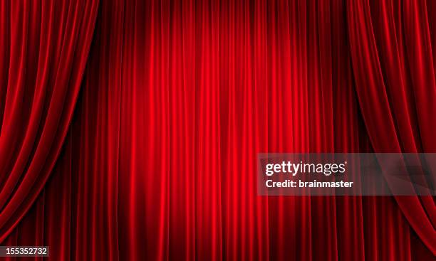 big event red curtains with spotlight - theatrical performance stock pictures, royalty-free photos & images