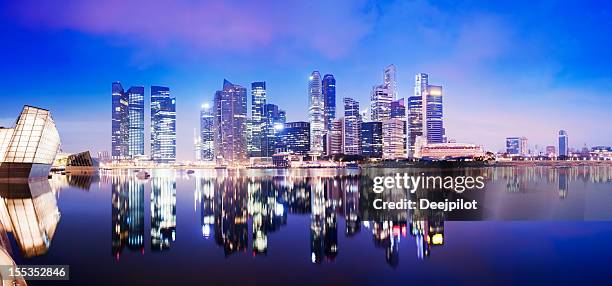 singapore city skyline and marina bay at night - marina bay singapore bildbanksfoton och bilder