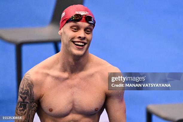 Britain's Matthew Richards celebrates after victory in the final of the men's 200m freestyle swimming event during the World Aquatics Championships...