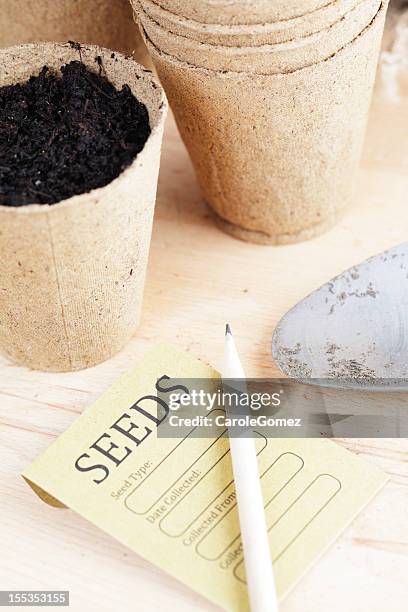 the potting shed - seed packet and pots - seed packet stock pictures, royalty-free photos & images