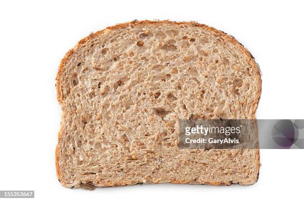 multiple grain bread slice with clipping path - volkorentarwe stockfoto's en -beelden