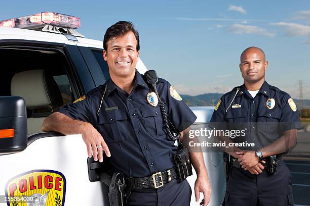 friendly police officers - highway patrol stockfoto's en -beelden