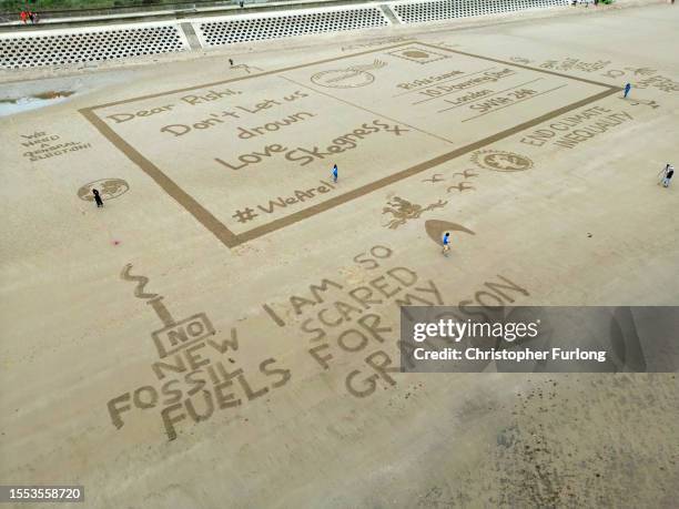 Giant sand drawing entitled 'Postcards from the Edge' sends a message to UK Prime Minster Rishi Sunak asking to help protect Skegness and the UK from...