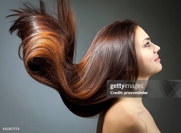 young woman portrait with beautiful hair - woman long brown hair stock pictures, royalty-free photos & images
