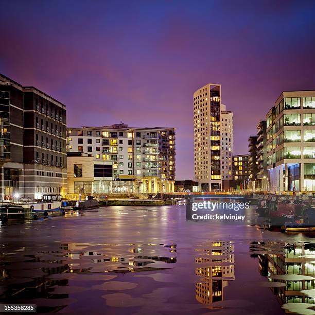 long exposure shot showing leeds dock in leeds at night. - leeds canal stock pictures, royalty-free photos & images