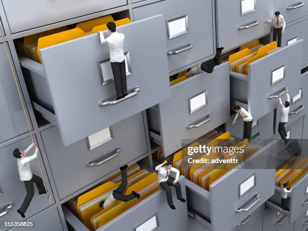 Someone Filing Paper Man Filing Paperwork Photos and Premium High Res Pictures - Getty Images