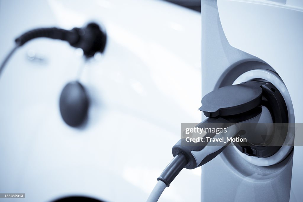 Carregamento de veículos elétricos, de foco no primeiro plano