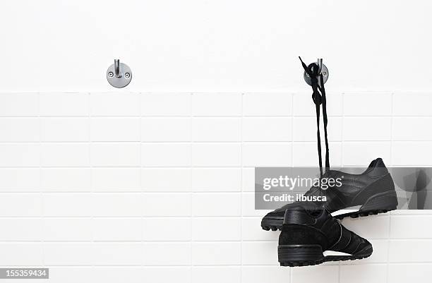 hang up soccer shoes - studded stock pictures, royalty-free photos & images