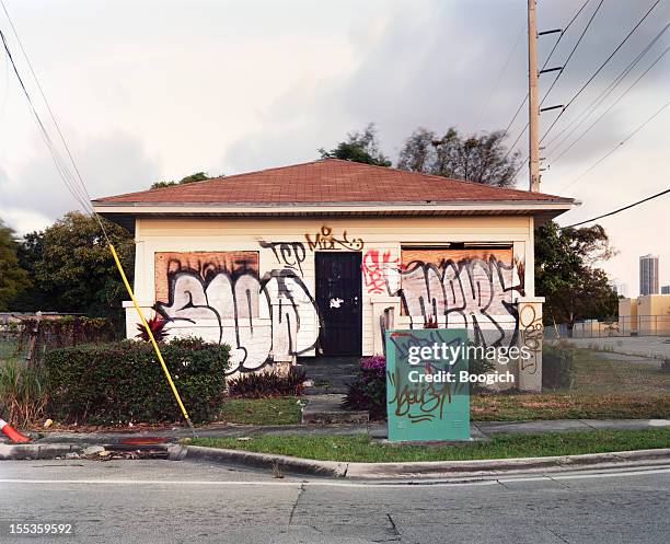 abandoned graffiti covered vandalized miami home - rudeness stock pictures, royalty-free photos & images