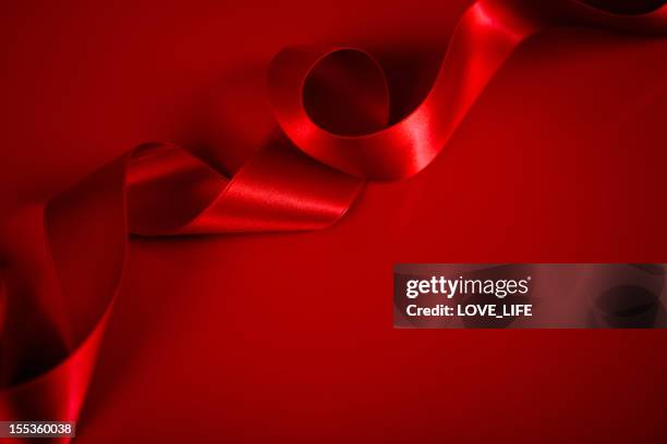 red satin ribbon background - satin bildbanksfoton och bilder