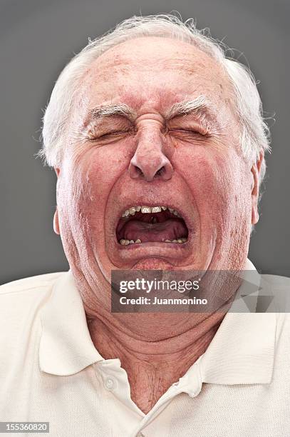 senior man crying (real people) - pain face portrait stockfoto's en -beelden