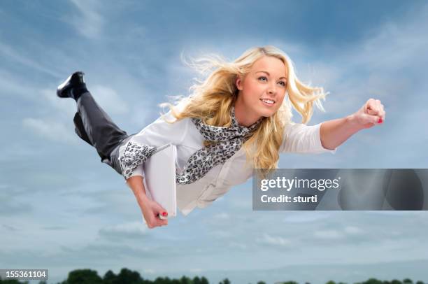 flying businesswoman - business hero stock pictures, royalty-free photos & images