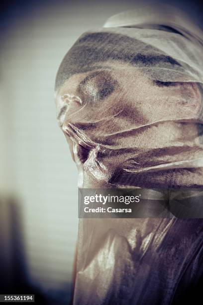 suffocating - stifle stock pictures, royalty-free photos & images