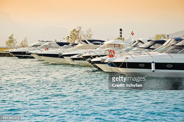 harbor at lago di garda lake - motor yacht stock pictures, royalty-free photos & images