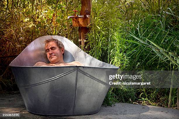 daydreaming in the bath - wash bowl stockfoto's en -beelden