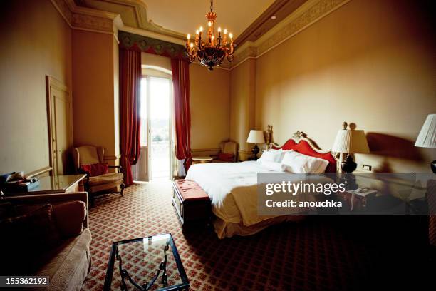cozy hotel room in firenze, italy - double bed stock pictures, royalty-free photos & images