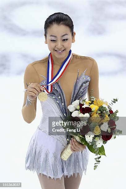 Ladies gold medalist Mao Asada of Japan poses for photo during the medal ceremony of Cup of China ISU Grand Prix of Figure Skating 2012 at the...