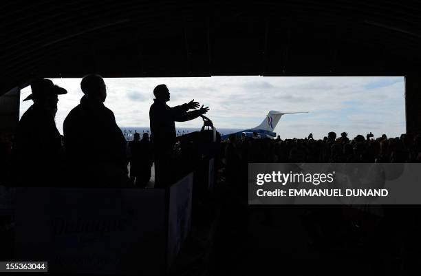 Republican Presidential candidate Mitt Romney holds a rally at Dubuque regional airport in Dubuque, Iowa, November 3, 2012. Romney is in Iowa as he...