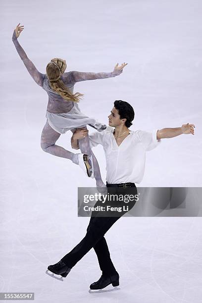 Kaitlyn Weaver and Andrew Poje of Canada skate in Ice Dance Free Dance during Cup of China ISU Grand Prix of Figure Skating 2012 at the Oriental...