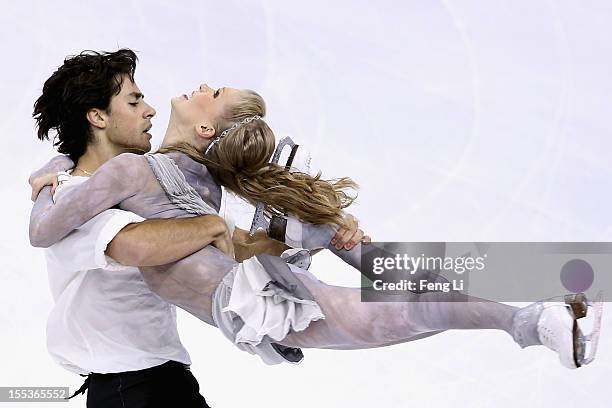 Kaitlyn Weaver and Andrew Poje of Canada skate in Ice Dance Free Dance during Cup of China ISU Grand Prix of Figure Skating 2012 at the Oriental...