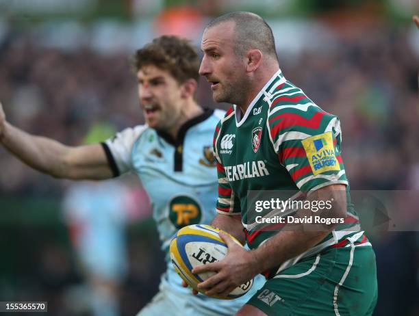 George Chuter of Leicester runs with the ball during the Aviva Premiership match between Leicester Tigers and Northampton Saints at Welford Road on...