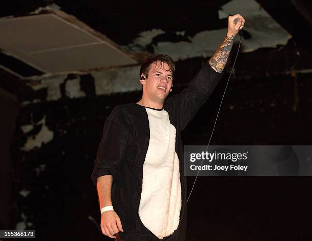 Vocalist Caleb Shomo of Attack Attack! performs onstage in a Halloween costume in concert at The Emerson Theater on October 26, 2012 in Indianapolis,...