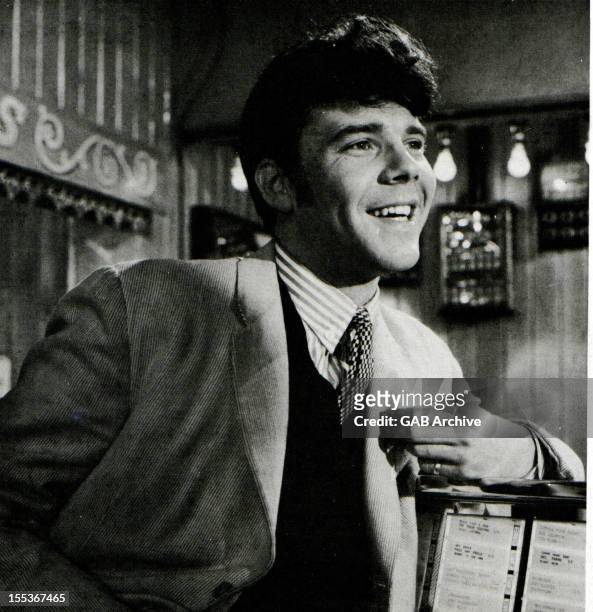 Photo of English pop singer and songwriter Marty Wilde appearing in the film 'What A Crazy World' released in 1963.