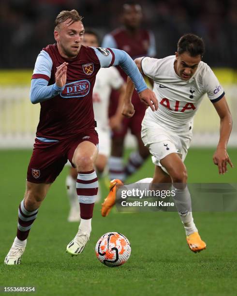 Jarrod Bowen of West Ham controls the ball against Sergio Reguilon of Hotspur during the pre-season friendly match between Tottenham Hotspur and West...