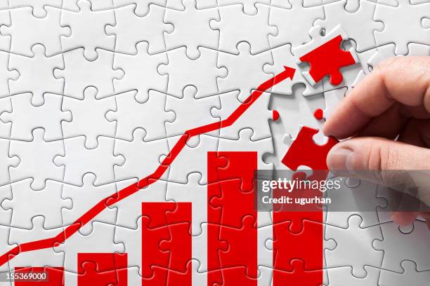 puzzle - moving up business stock pictures, royalty-free photos & images