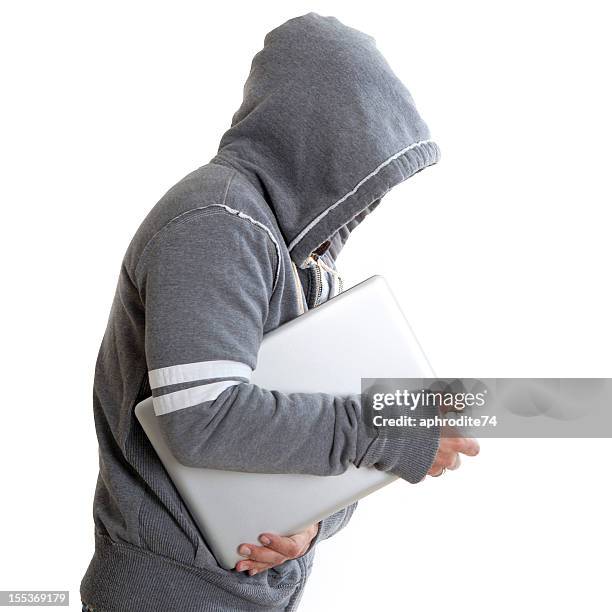 computer hacking - hacker hoodie stock pictures, royalty-free photos & images