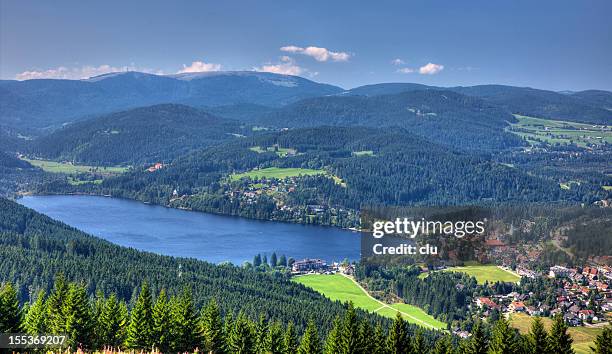 view of lake titisee and the mountain feldberg - black forest germany stock pictures, royalty-free photos & images