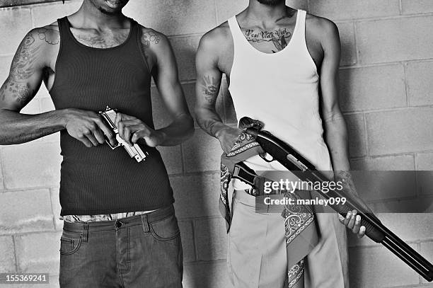 two gang members with guns - anti bullying stockfoto's en -beelden