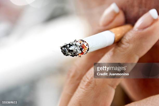 woman smoking - smoking issues stock pictures, royalty-free photos & images