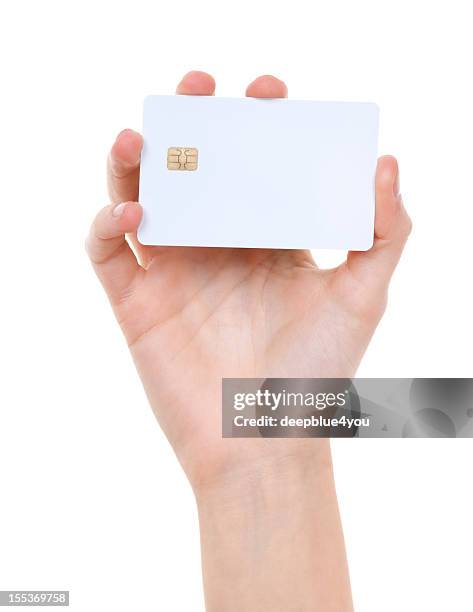 white prepaid card in woman hand - hand holding credit card stock pictures, royalty-free photos & images
