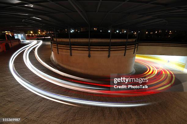 long exposure of car's light  - xlarge - racing lights stock pictures, royalty-free photos & images