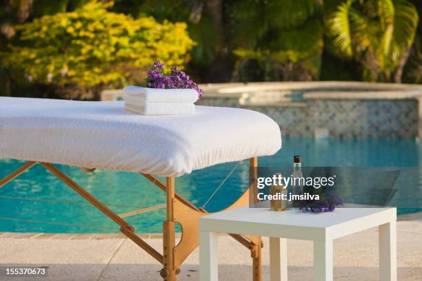 spa - massage table stock pictures, royalty-free photos & images